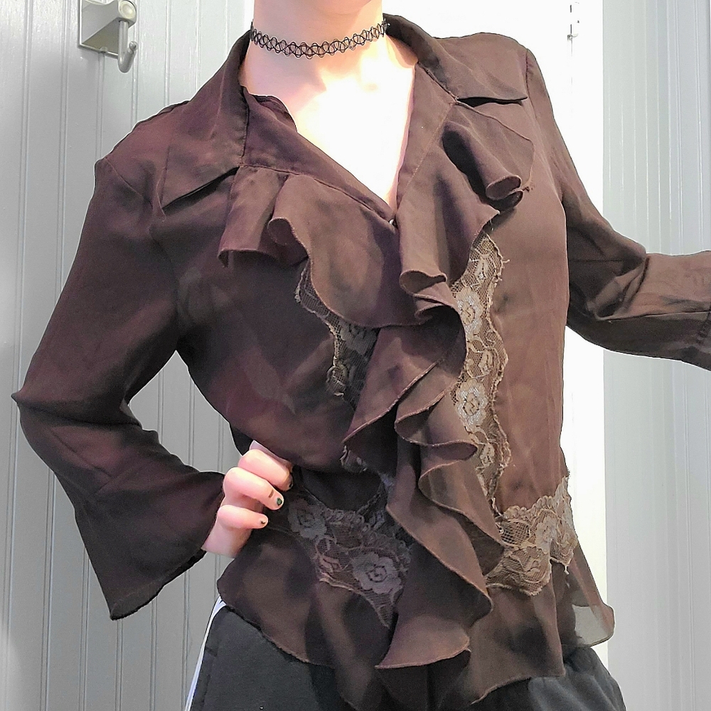brown ruffled shirt